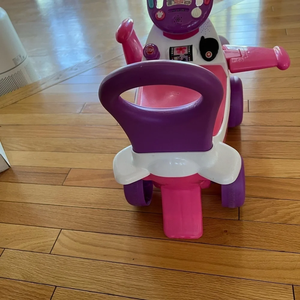 Disney’s Minnie airplane Pink + Purple Ride-On Airplane Toy